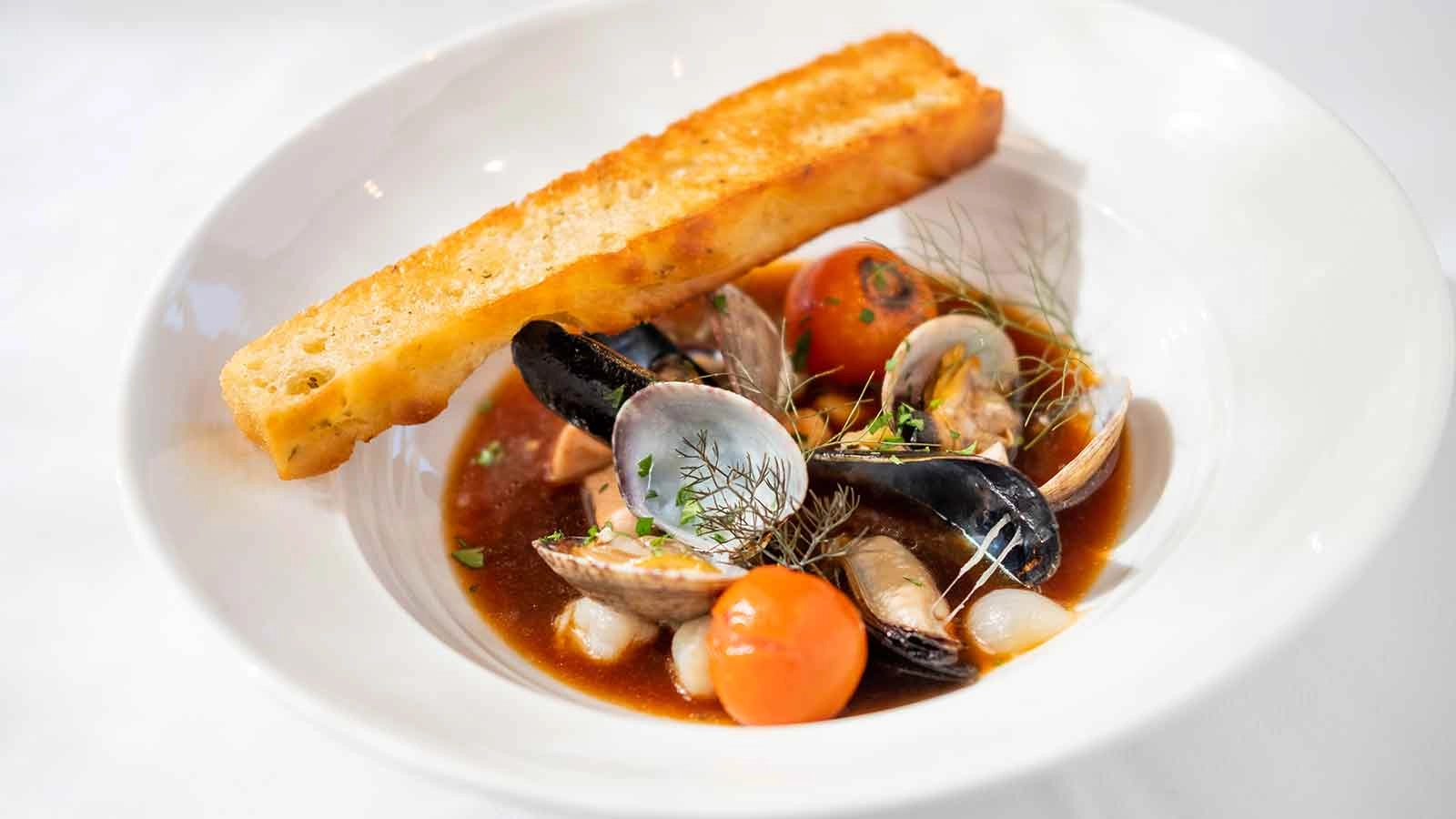 Seafood Cioppino with mussels, clams, shrimp, fennel, onion, focaccia crostini, on the menu at Gatehouse Restaurant at The Culinary Institute of America at Greystone in the Napa Valley.