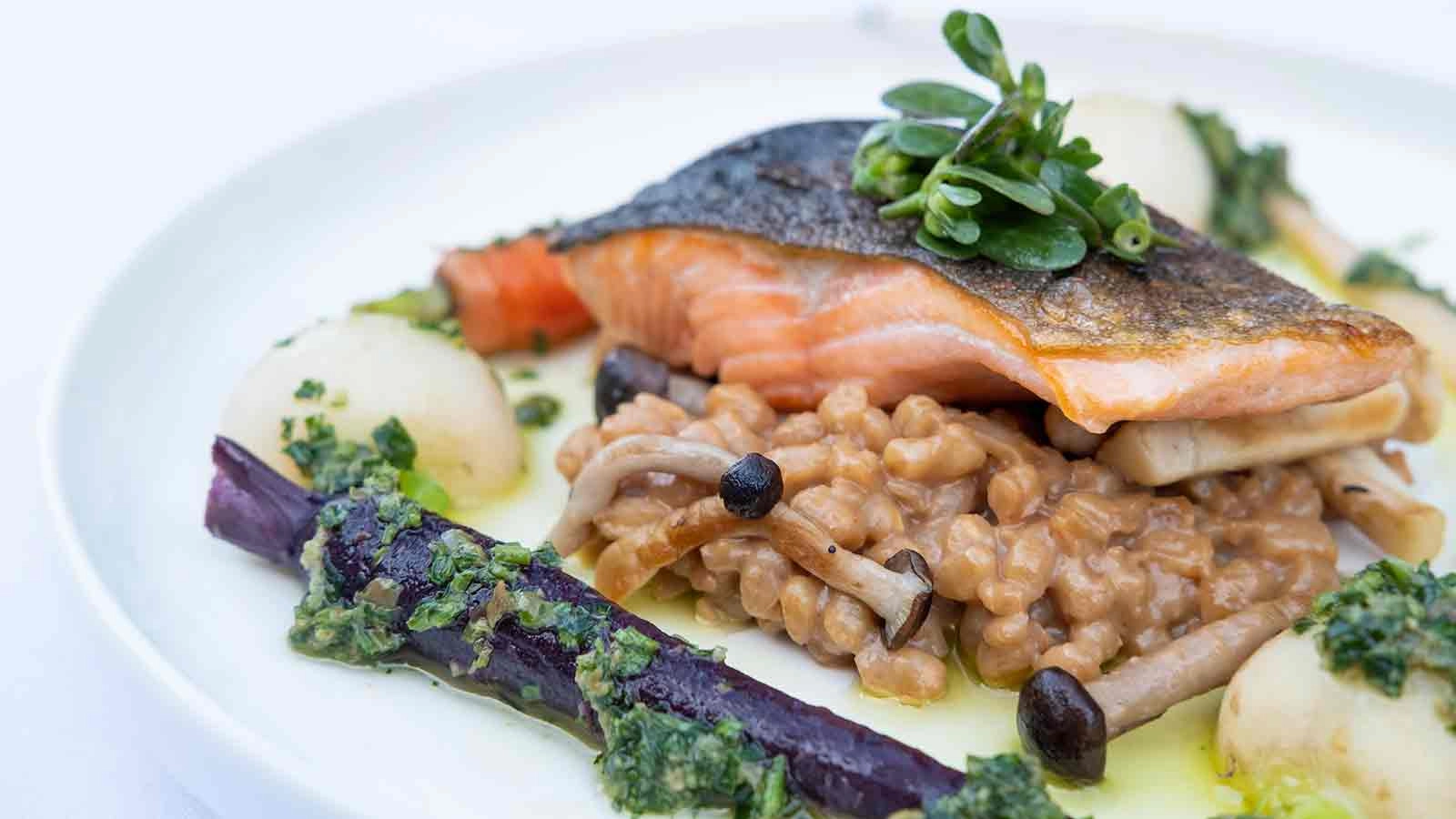 Olive Oil Poached Arctic Char with farro risotto, mushrooms, purslane, salsa verde, served at Gatehouse Restaurant at the CIA at Greystone in the Napa Valley.